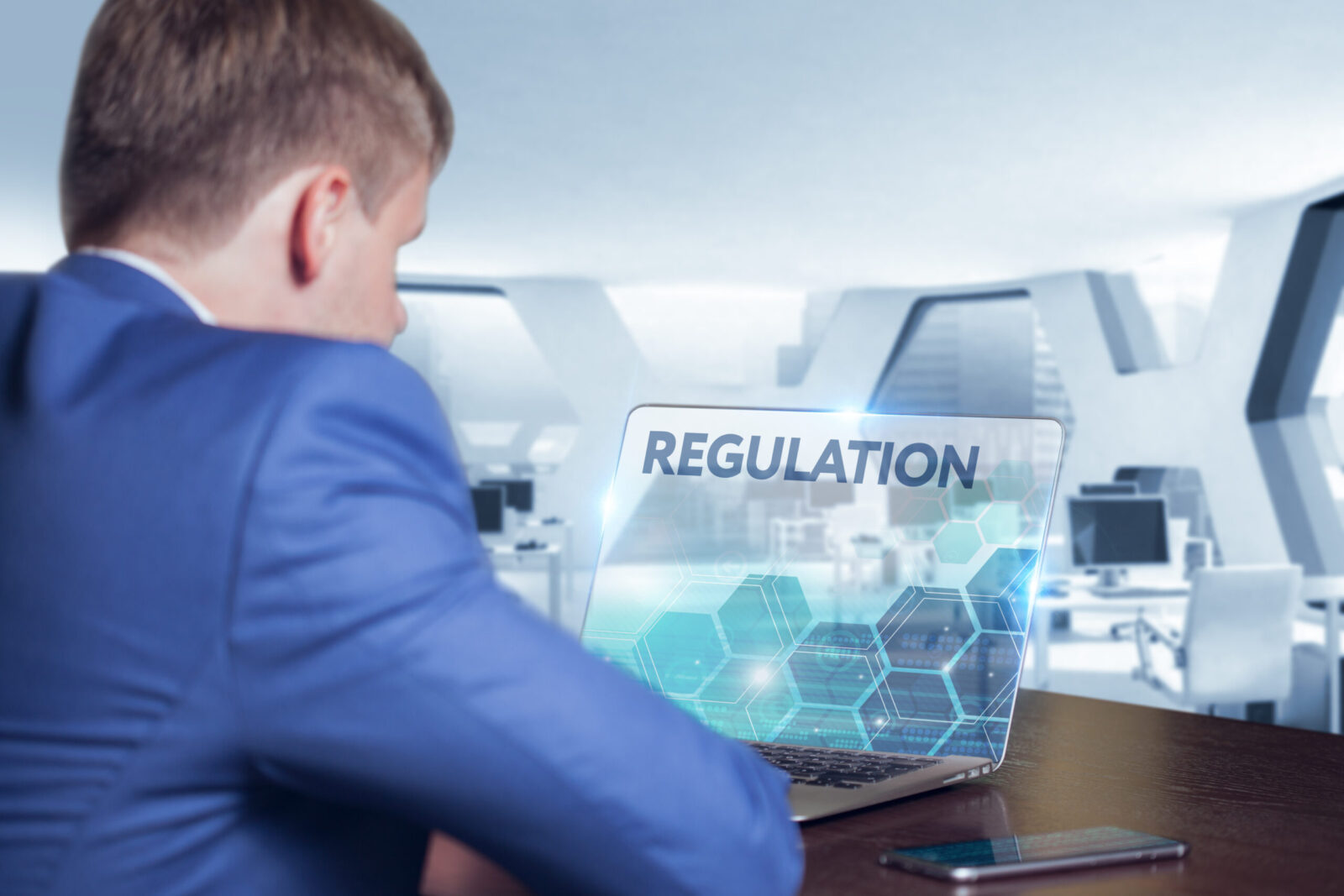 Business, Technology, Internet and network concept. Business man working on the tablet of the future, select on the virtual display: Regulation